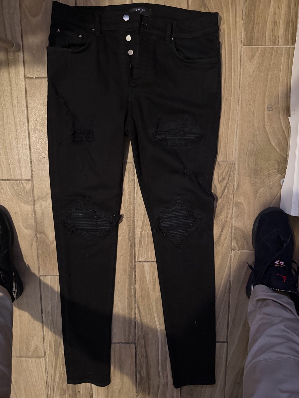 AMIRI Black Distressed Skinny Jeans